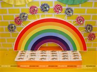 Candy counter setup for lolly pops for kids on a rainbow
