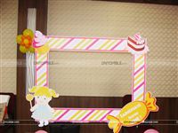 A candyland photo booth to entertain your guests at the party 