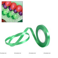Dark green curling ribbon